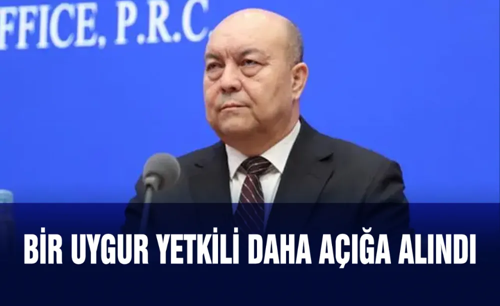 Bir Uygur yetkili daha açığa alındı