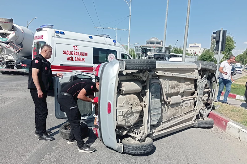 Yan yatan otomobilden sürücü yara almadan kurtuldu