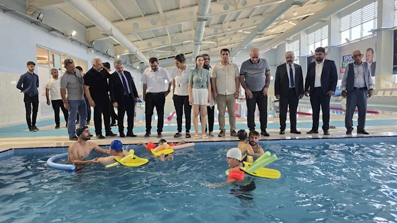 Milletvekili Özhan’dan özel sporculara anlamlı ziyaret: ‘Yüzmede engel yok’ 